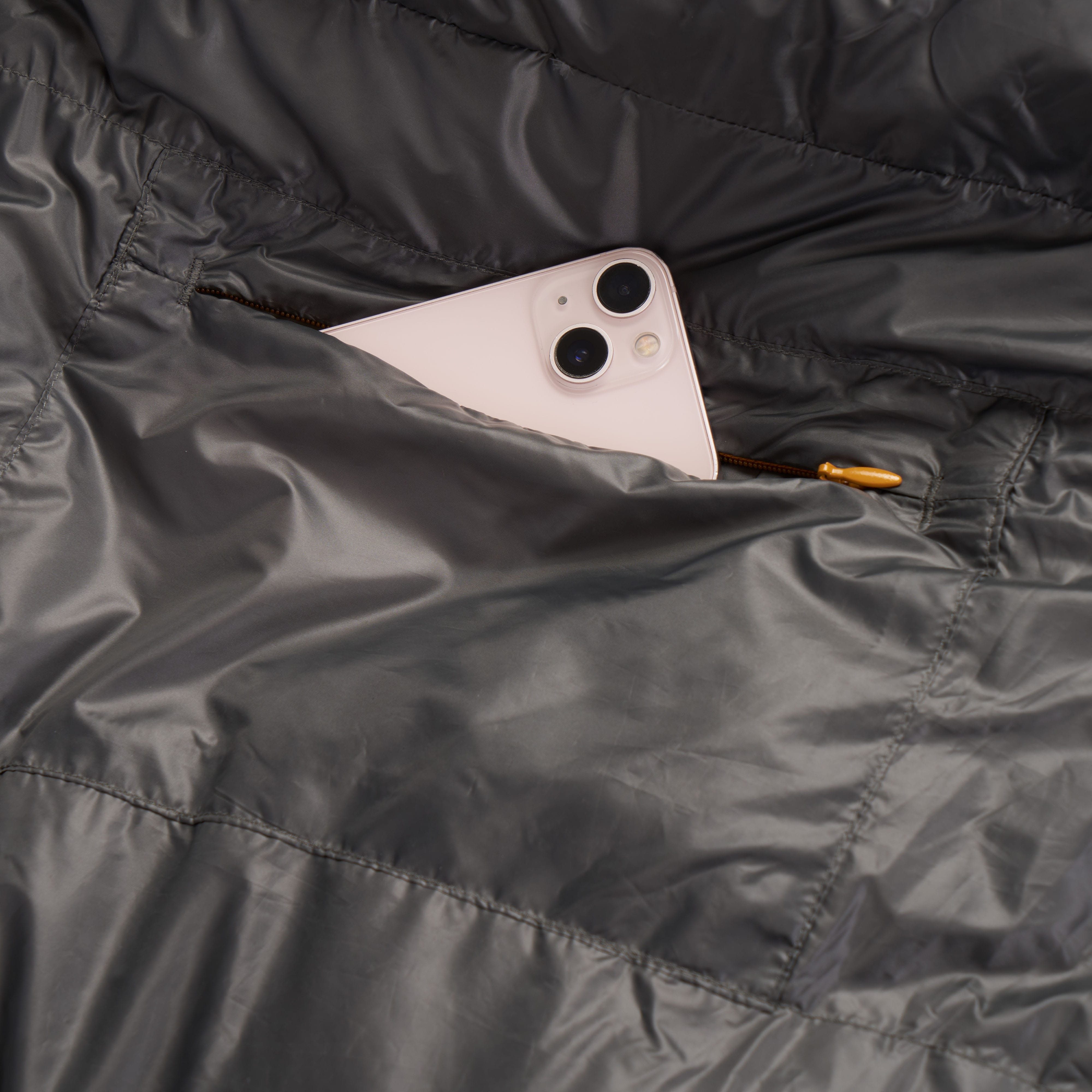 Phone inside the Exped lightweight sleeping bag down