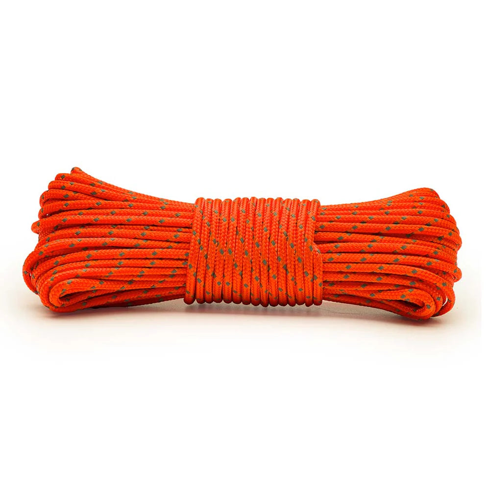 Coiled orange rope on a white background