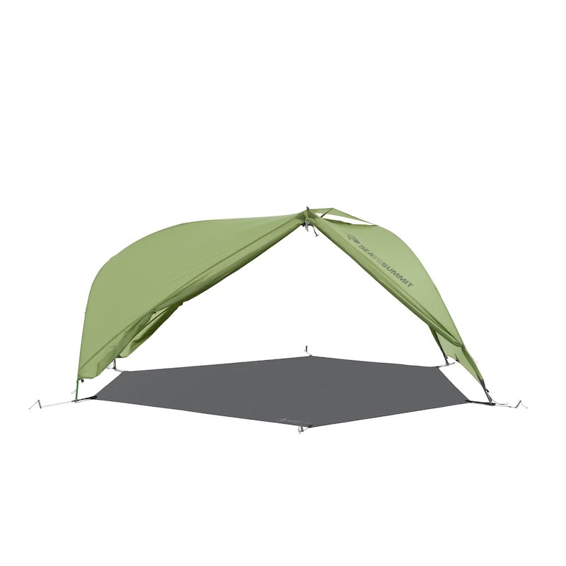 A green Sea To Summit Telos Bigfoot Footprint laid out on a white background, designed to protect tent floor from abrasion, dirt and to keep it dry.