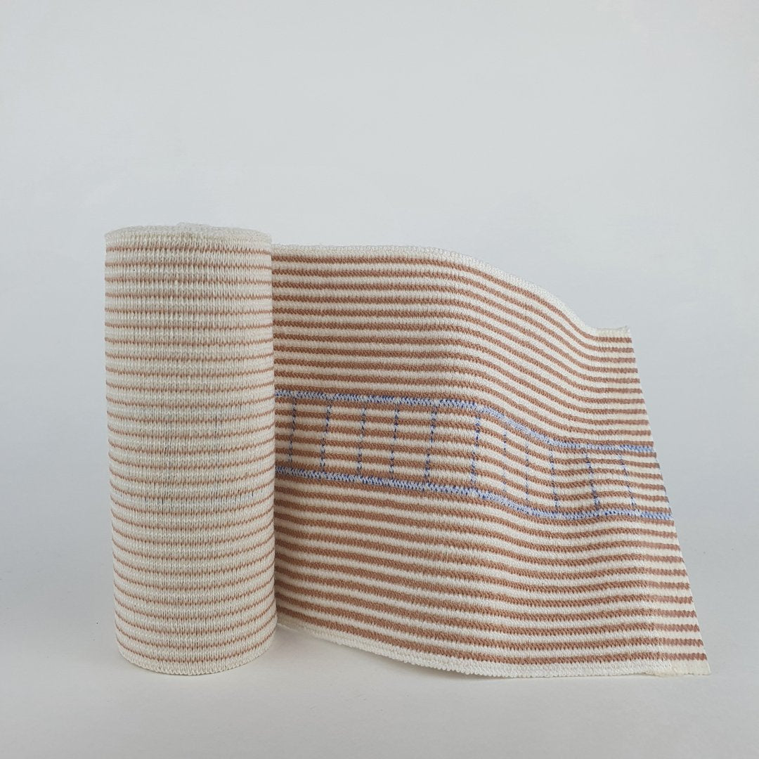 Snake bite bandage with tension indicators