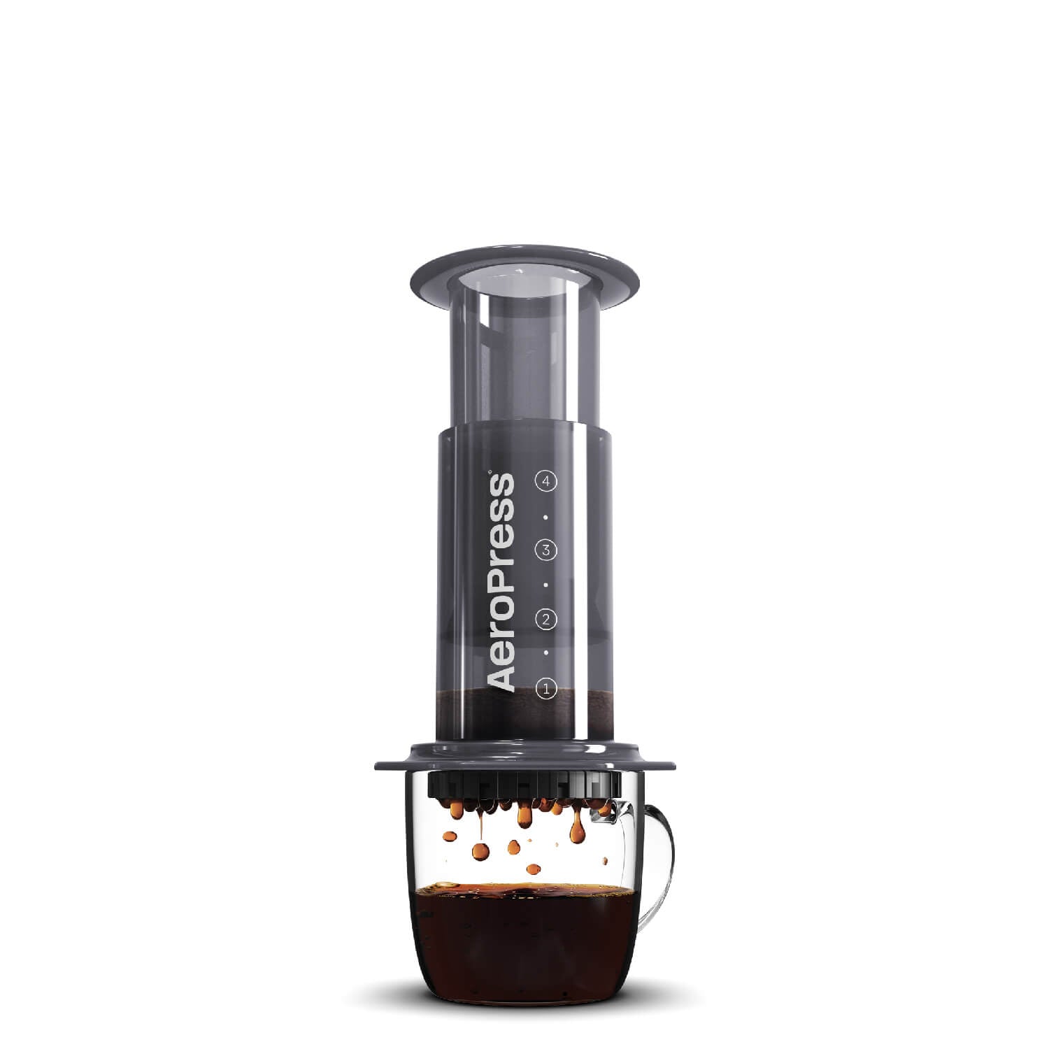 Aerpress portable coffee maker on a cup of coffee