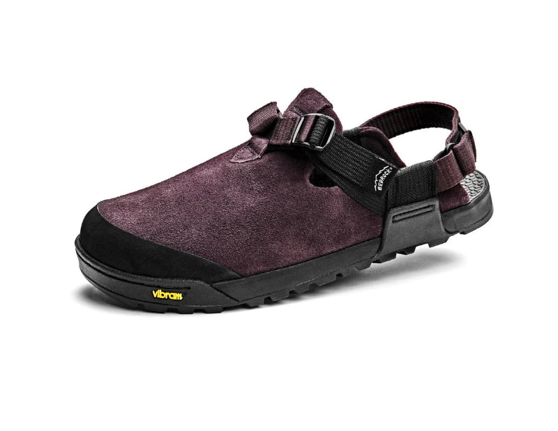 Purple sandal with black sole on a white background