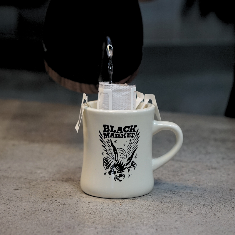 A black market coffee baggie with a kettle