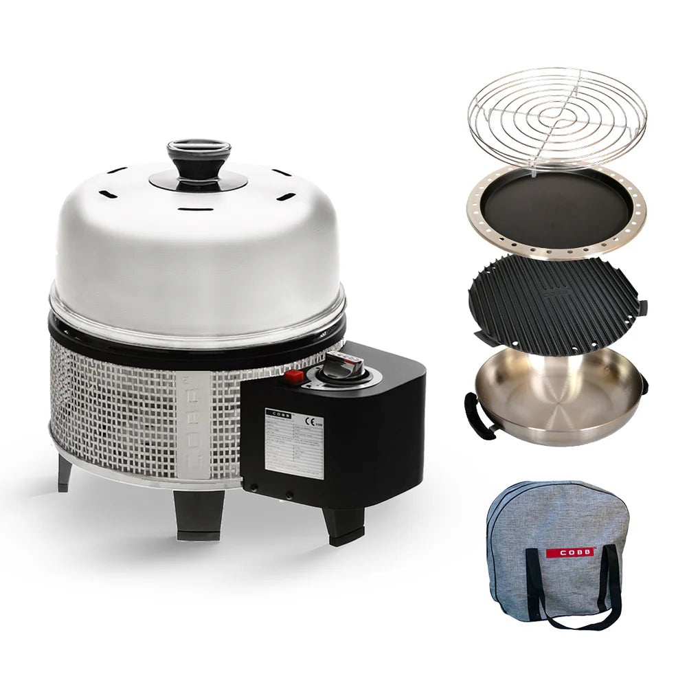 cobb gas combo with griddle, fenced roast rack, wok, frying pan