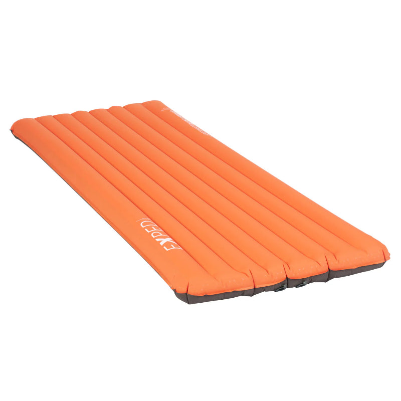 Orange inflatable camping mattress on a white background