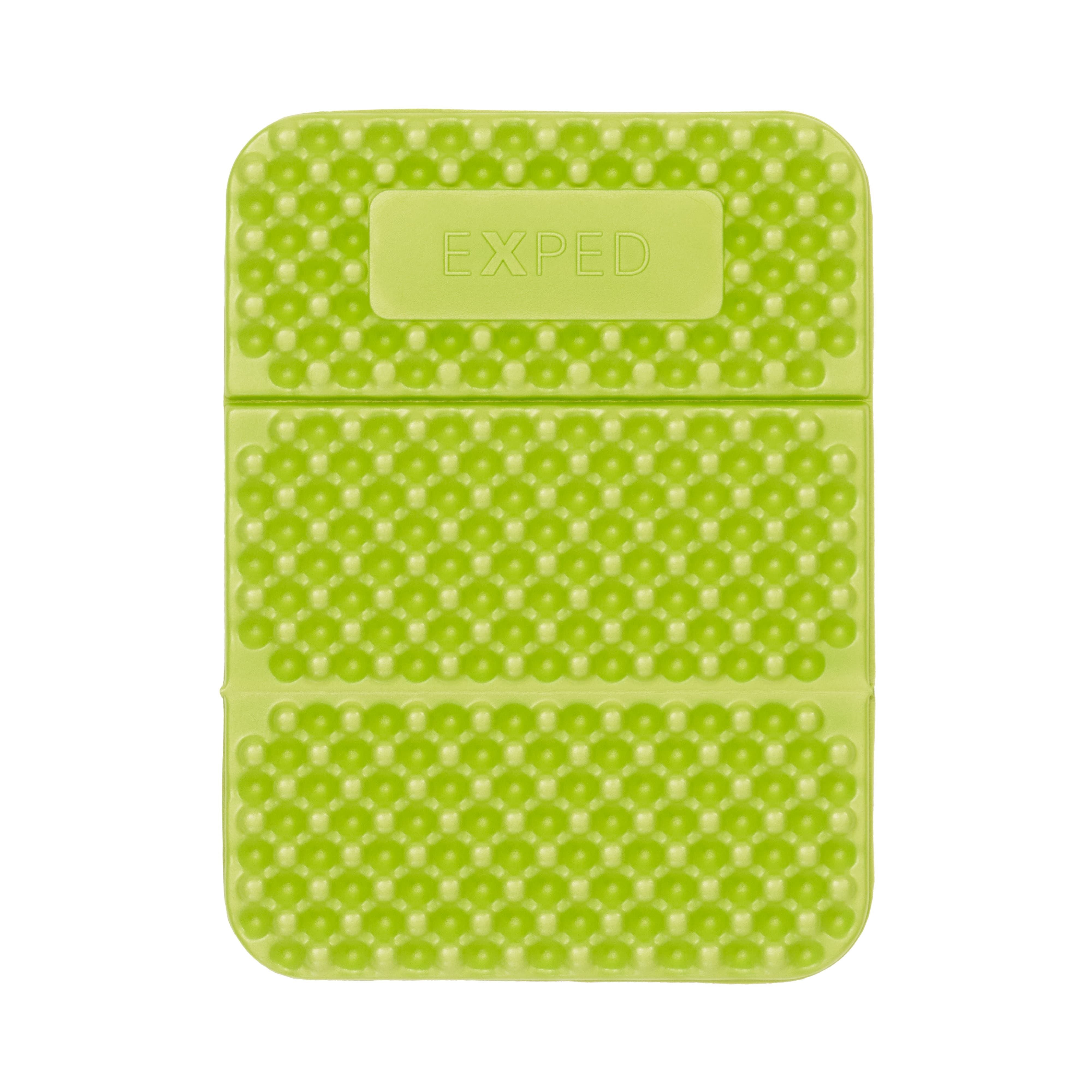 Green textured sit pad with 'Exped' branding on a white background