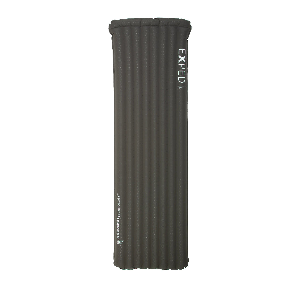 A rolled-up Exped Ultra 6R sleeping mat in gray color, with the brand name 'EXPED' visible on the top end of the mat.