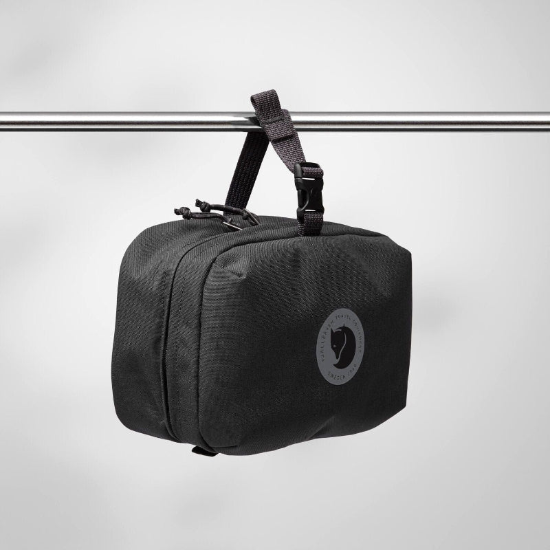 Black travel bag with a logo on a white background