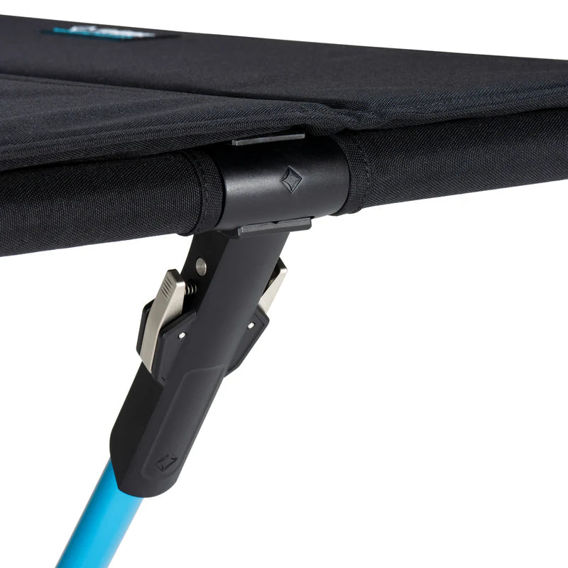 Close-up of the camping tablewith a blue leg on a white background
