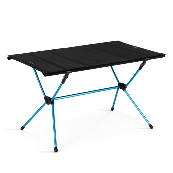 Packable camping table set up with blue legs and a black top
