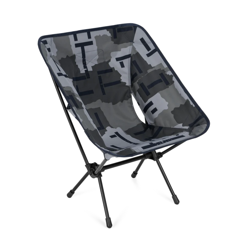 Camouflage-patterned folding chair on a white background