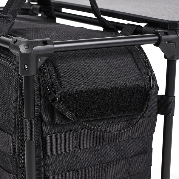 Black tactical backpack with a handle and MOLLE webbing on a gray background
