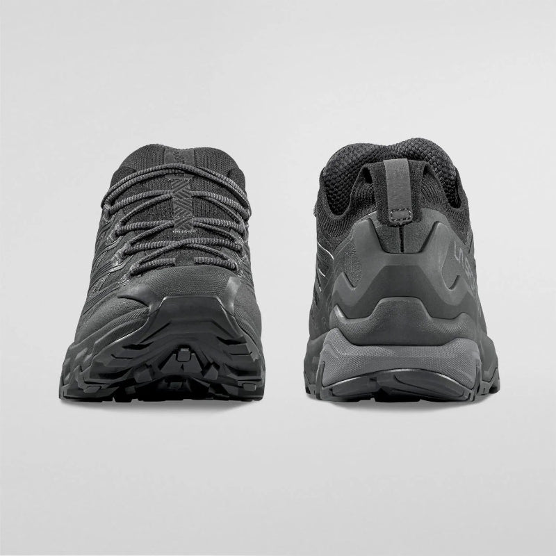 Black hiking boots shown from the back on a light gray background