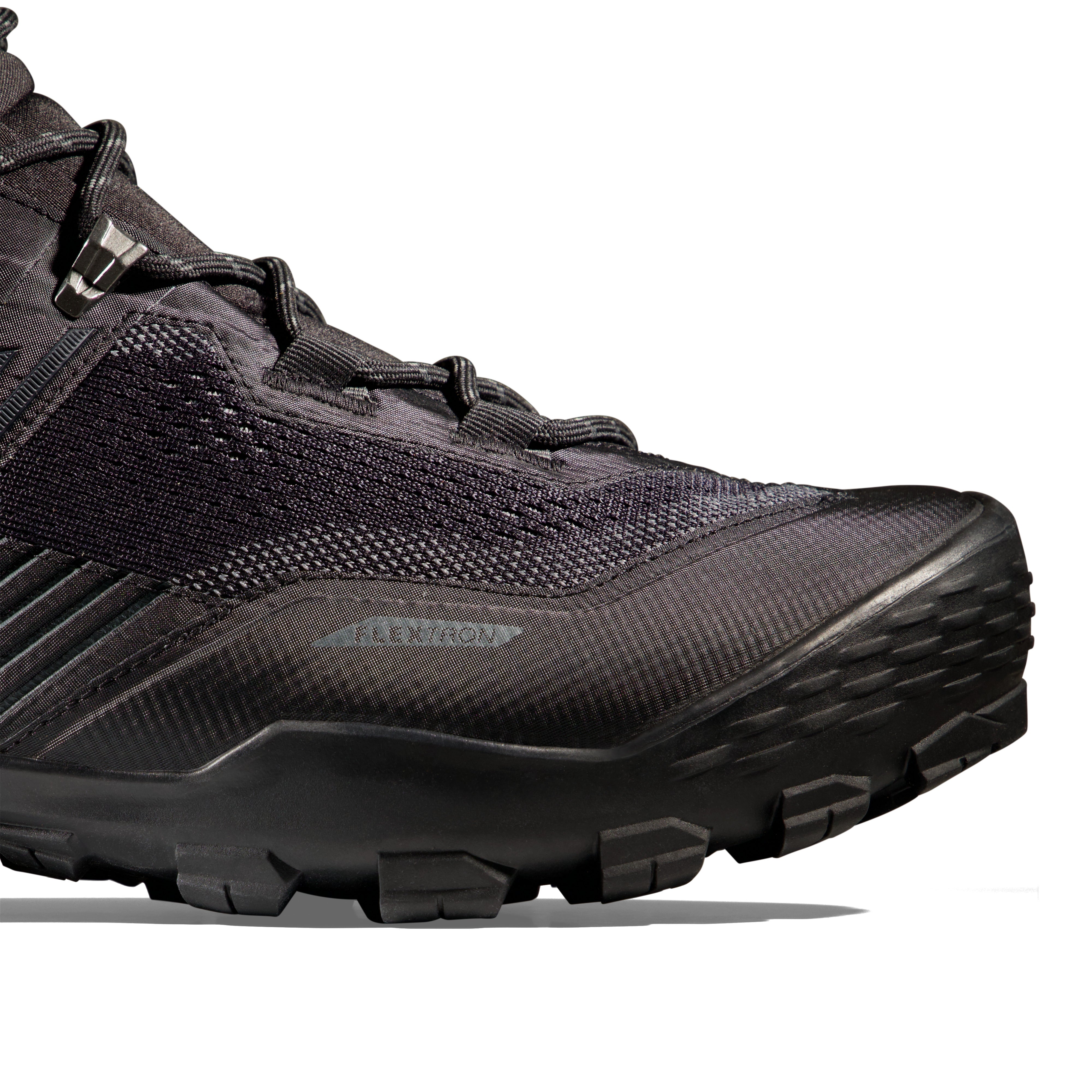 Black hiking boot with textured sole on a white background