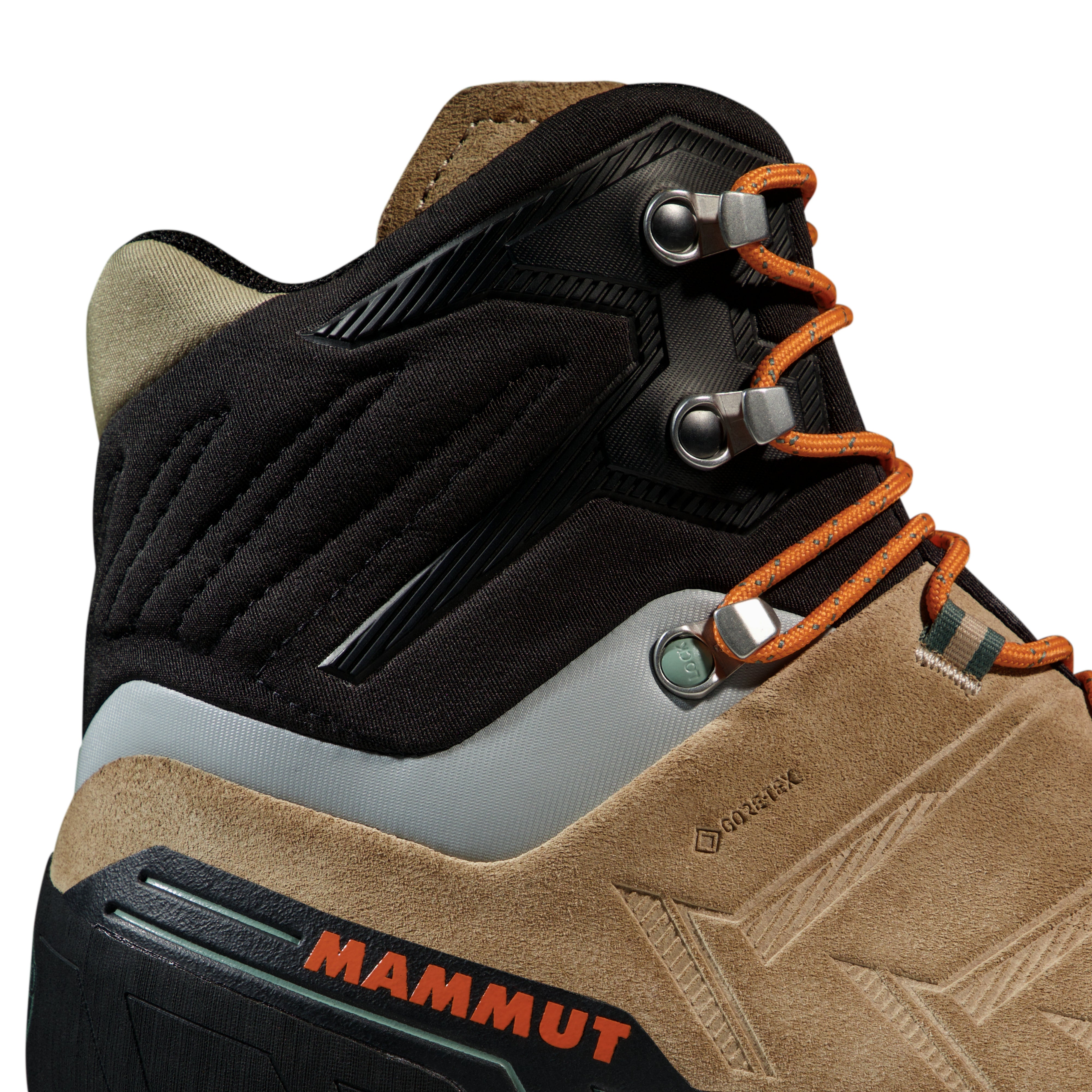 Close-up of a brown hiking boot with orange laces and Mammut branding on a white background