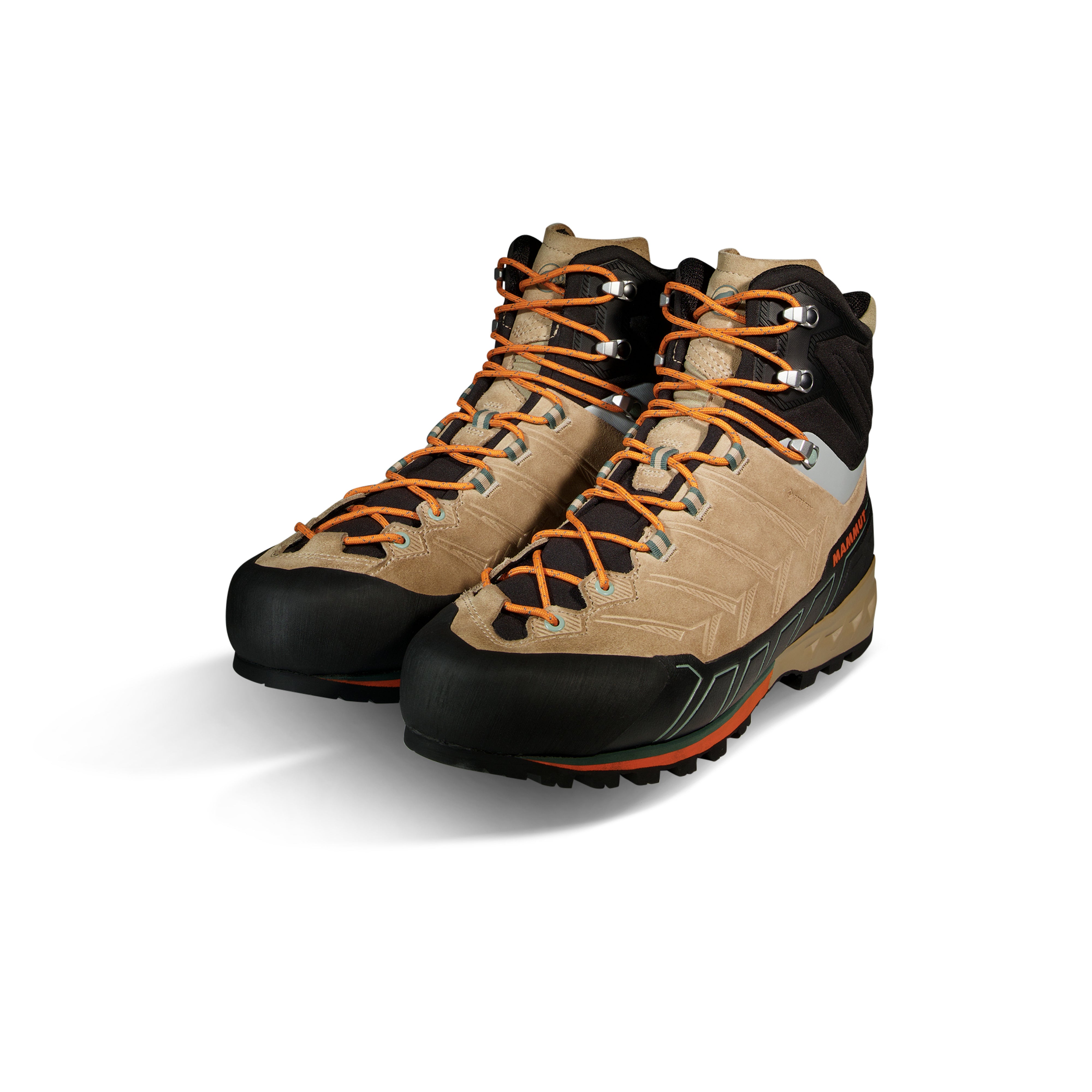 Pair of beige and black hiking boots with orange laces on a white background