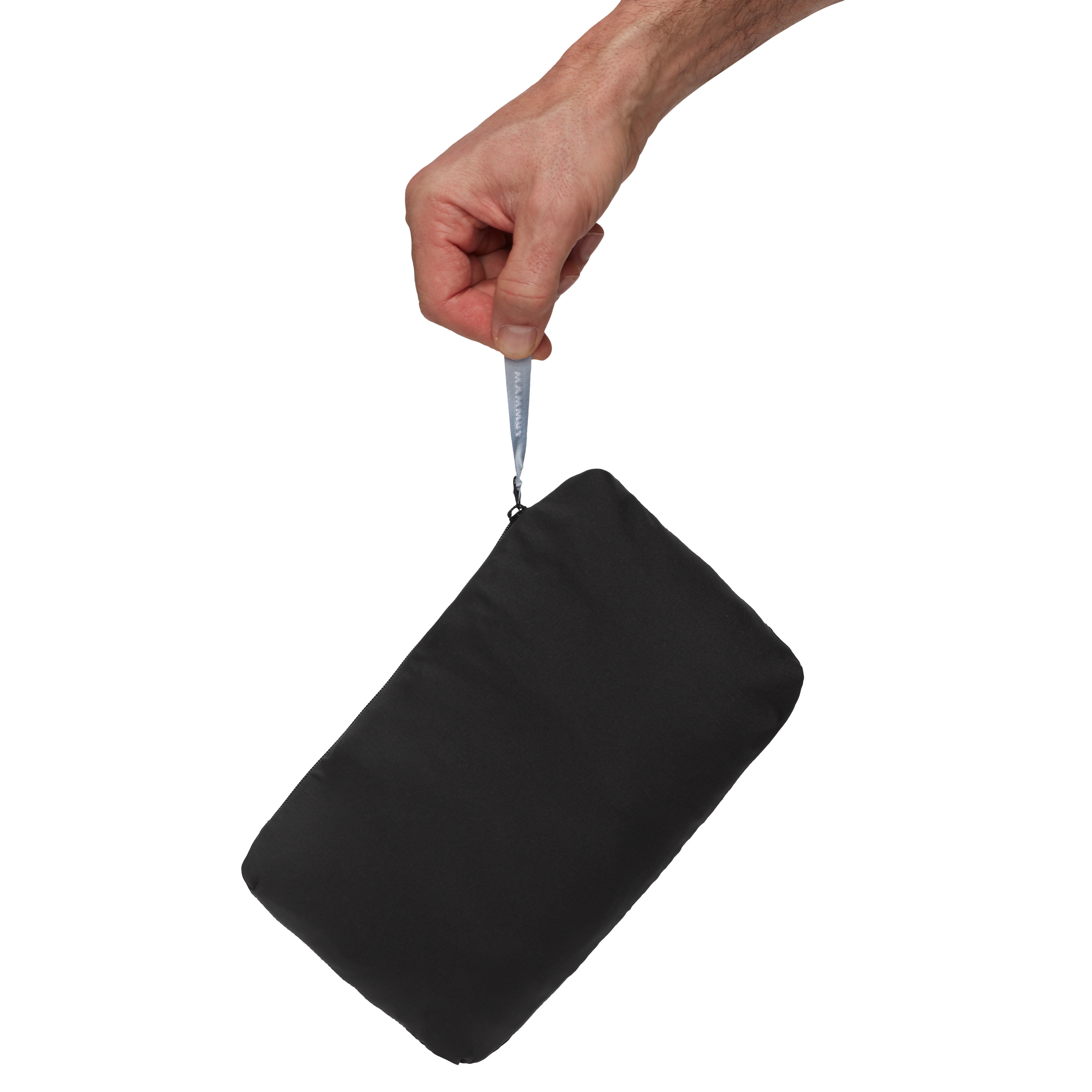 Hand holding a black pouch 