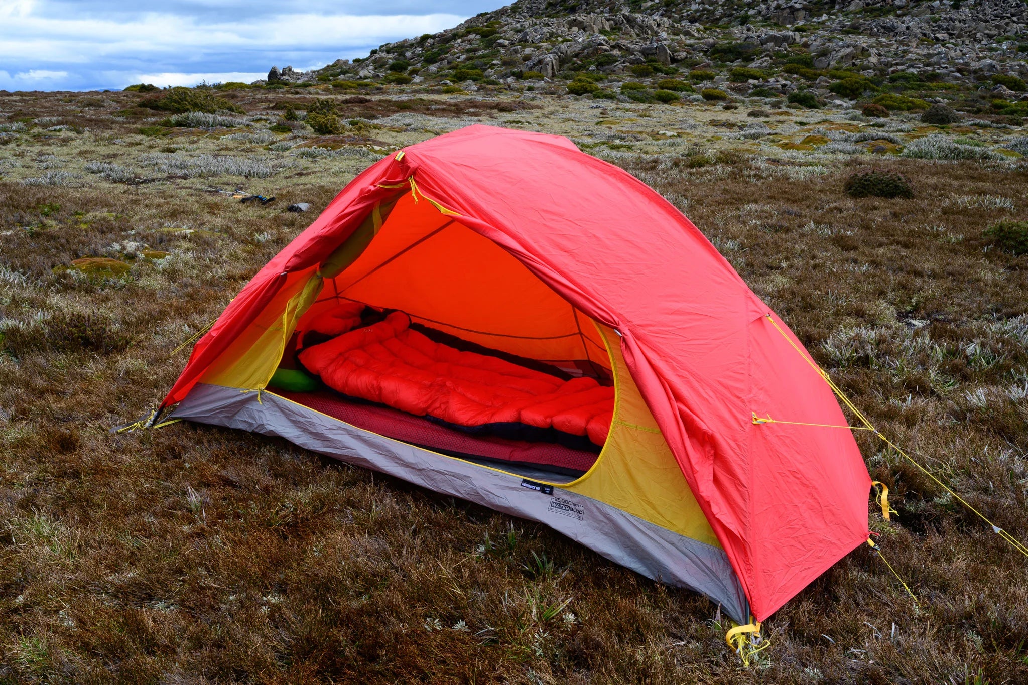 Red Mont Zero Ultralight 12 to 6°c Down Sleeping Bag in Mont Moondance Tent hiking tent