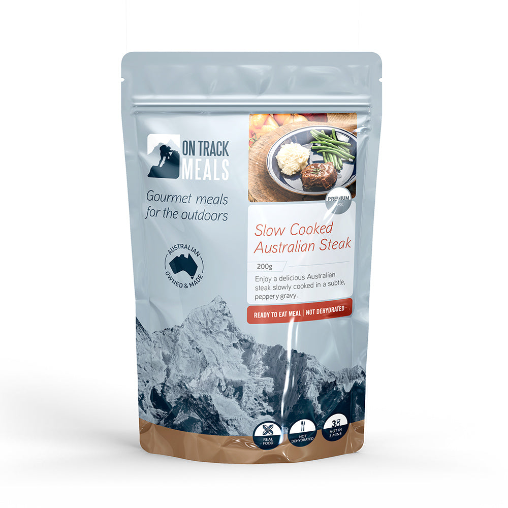 On Track Meals Slow Cooked Australian Steak in a blue packet on a white background