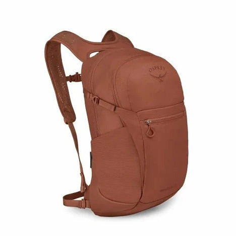 Orange Osprey backpack on a white background