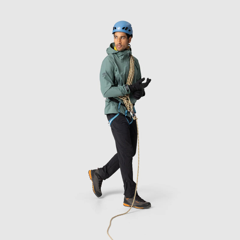 Person wearing climbing gear with a rope on a white background