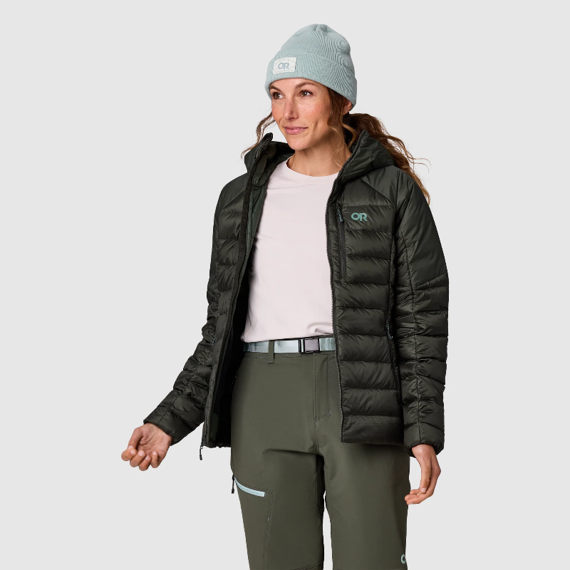 Person wearing a black puffer jacket with a visible brand logo on a white background