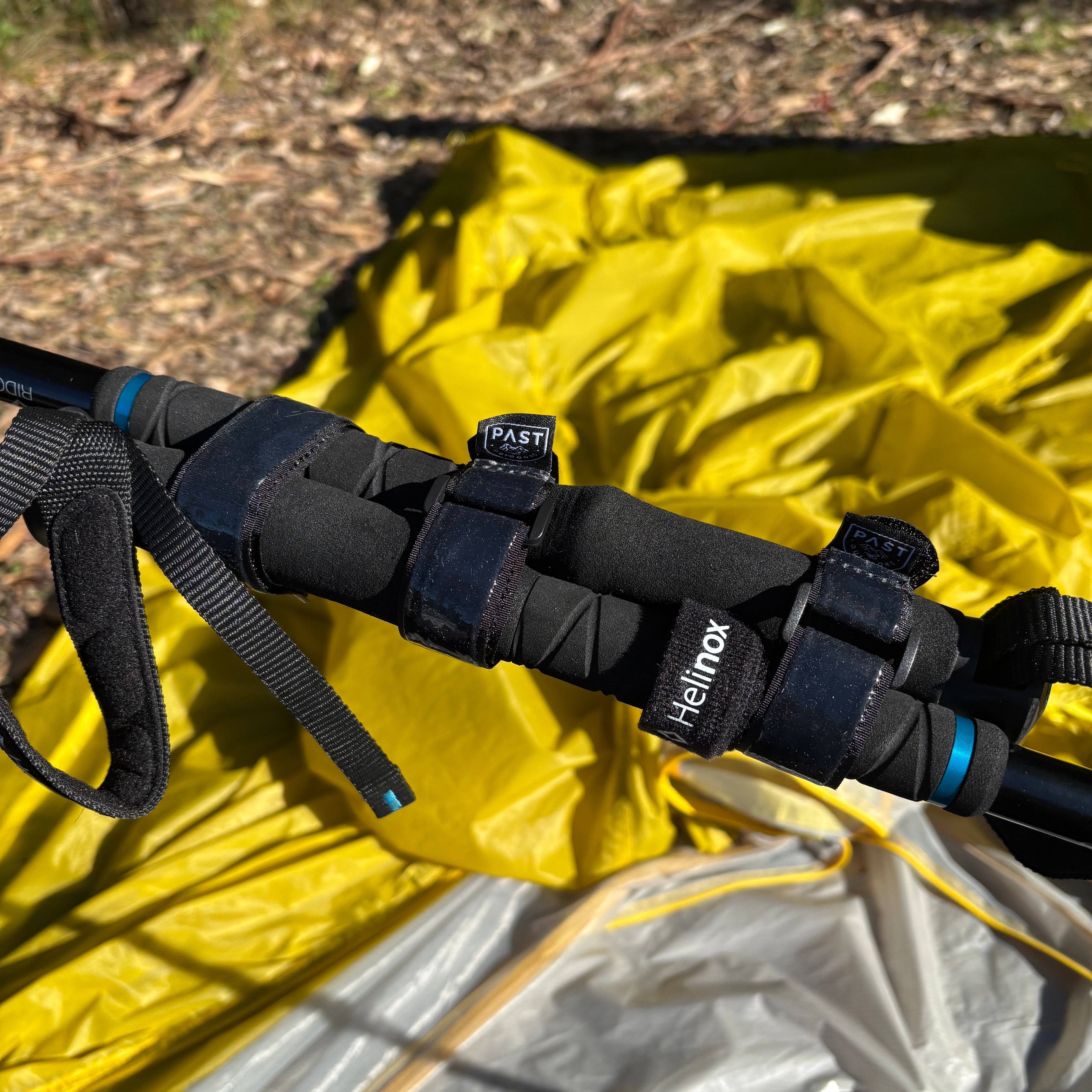 Close up of trekking poles attached by PAST Pu Coated Straps