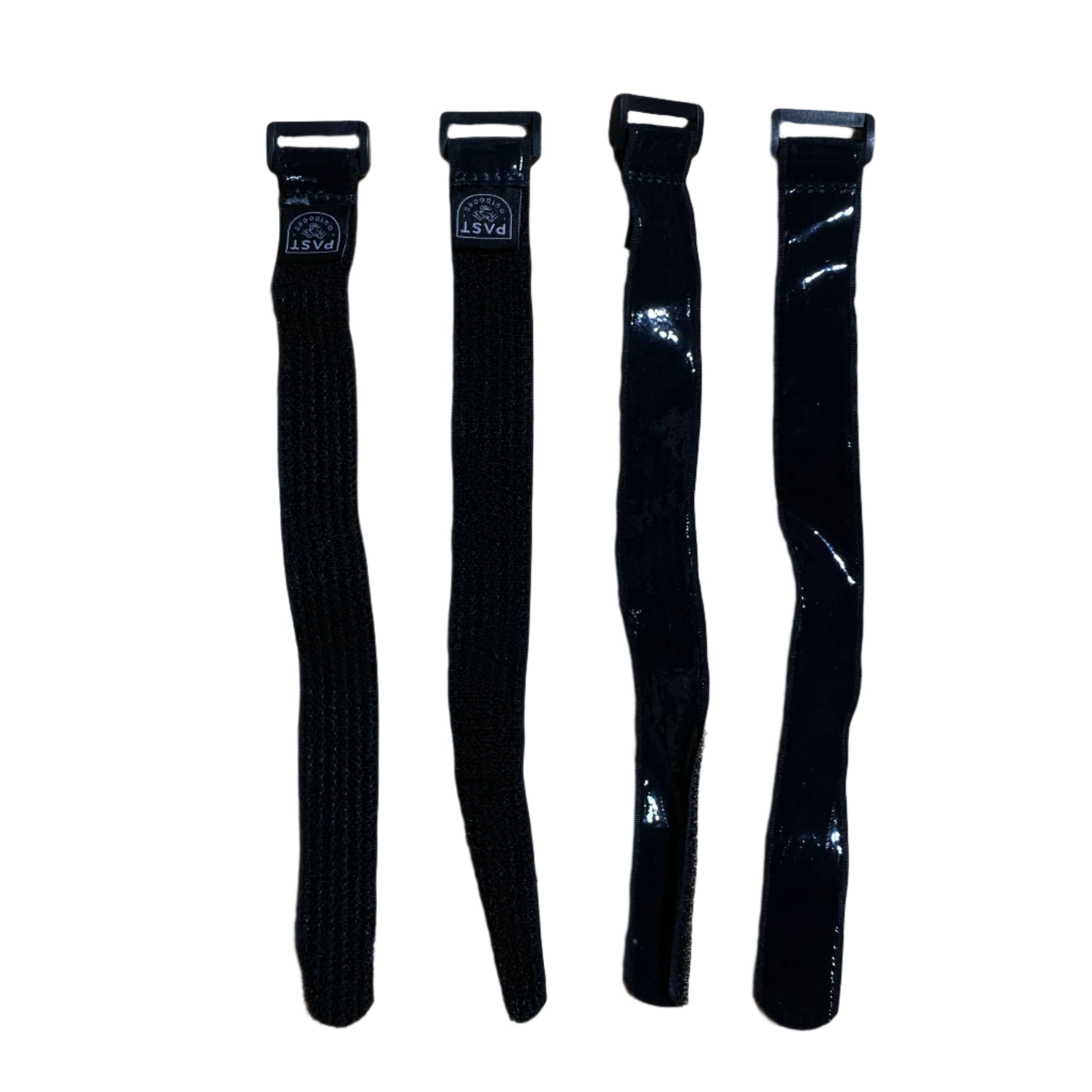 Four black straps with buckles on a white background