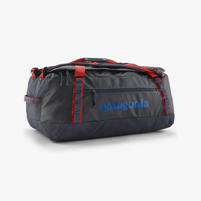 Gray duffel bag with red accents and Patagonia logo on a white background