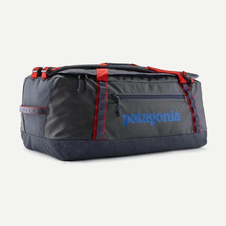 Gray duffel bag with red accents and Patagonia logo on a white background
