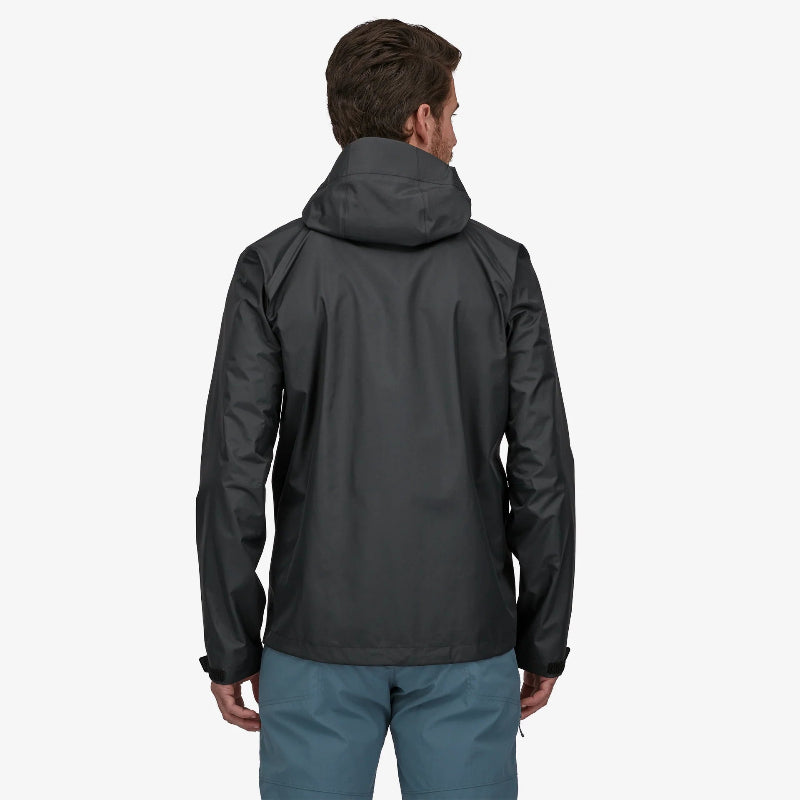 Patagonia Men's Torrentshell 3L Rain Jacket Black Worn by a man in blue pants