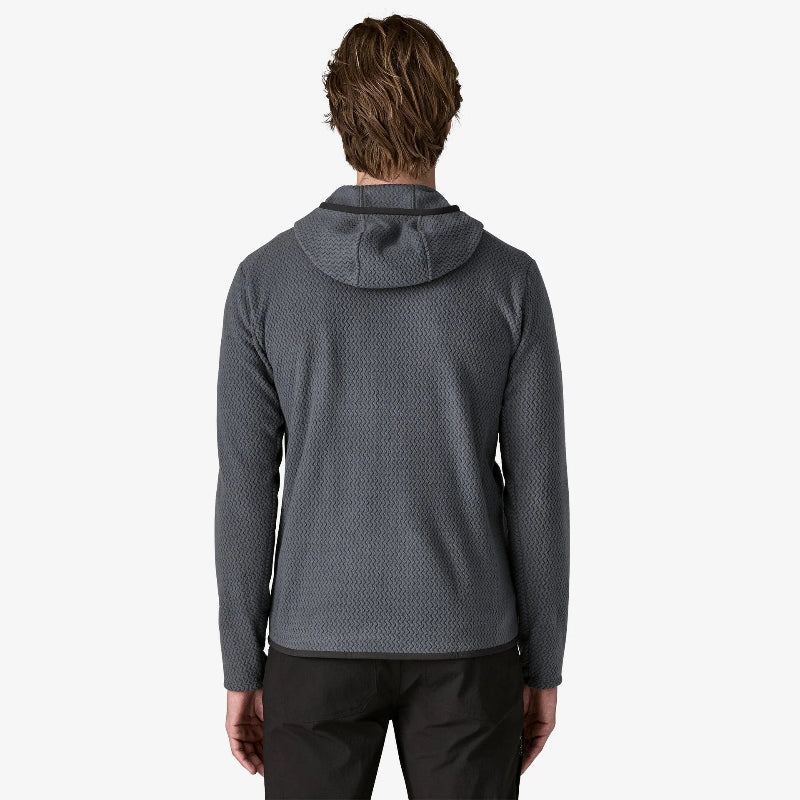 Man showing his back wearing the Patagonia Mens R1 Air Fleece Full Zip Hooded Jacket in smolder blue