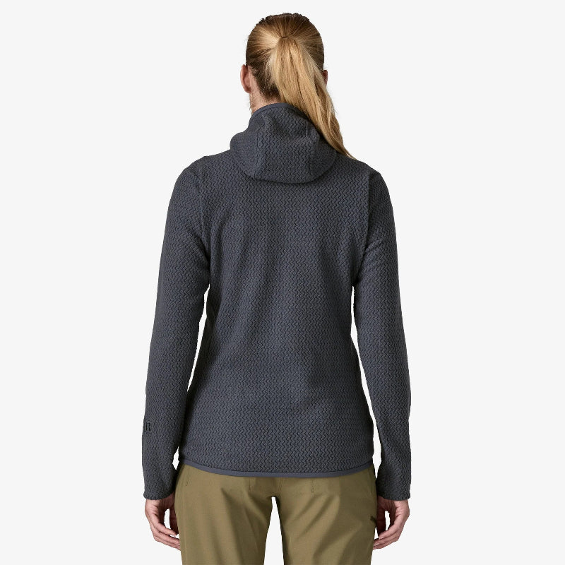 Woman facing away showing the back of the Patagonia Women's R1 Air Fleece Full-Zip Hoody in Smolder Blue