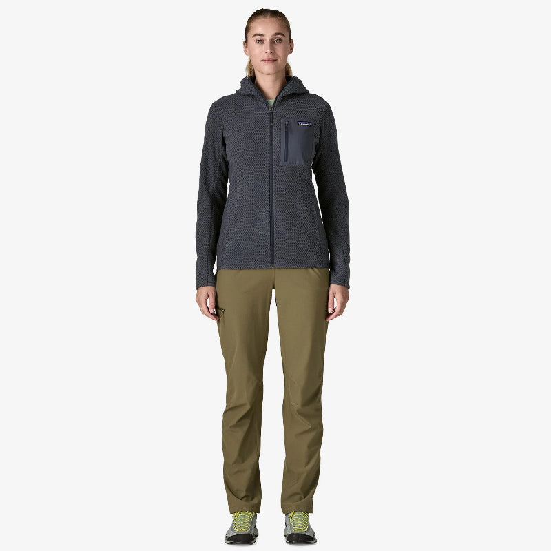 Patagonia Women's R1 Air Fleece Full-Zip Hoody Smolder Blue worn by a woman standing front on in beige pants