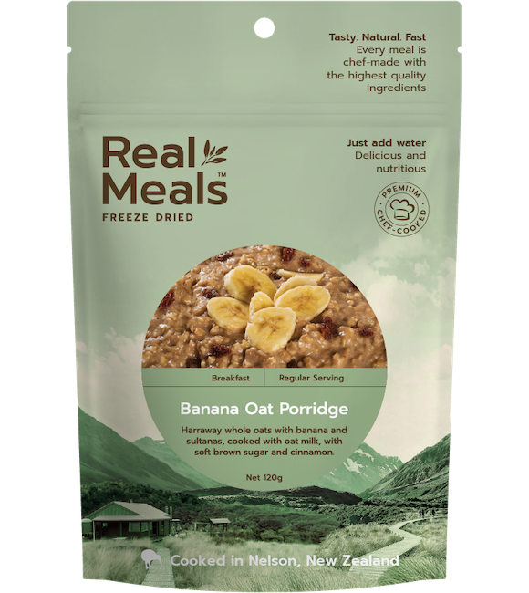 Package of Real Meals freeze-dried banana oat porridge with a scenic background