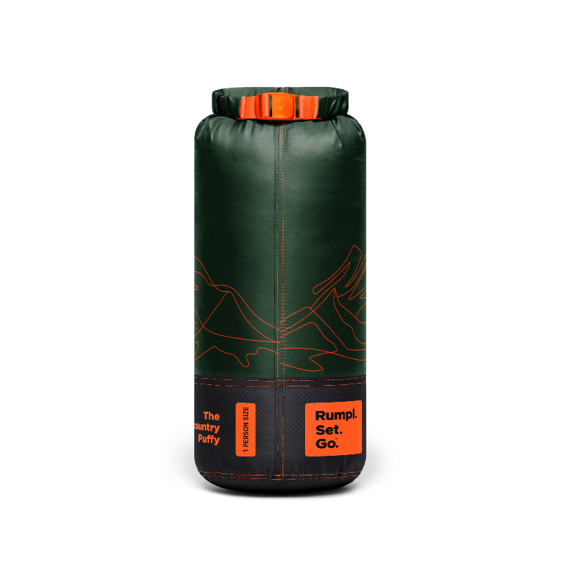 A dark green dry bag with orange accents, including a roll-top closure, orange line-art graphics, and orange text labels reading 'The Memory Puffy' and 'Rumpl. Set.