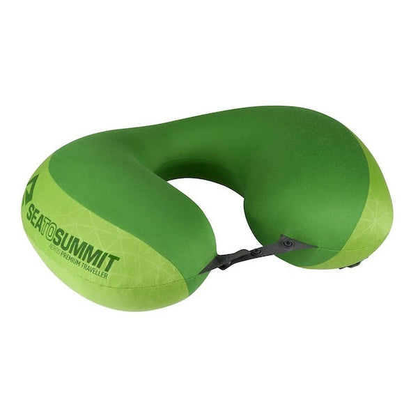 A Sea To Summit Aeros Premium Traveller Pillow, green with a branded white section on one end, displayed in an inflated state against a white background.