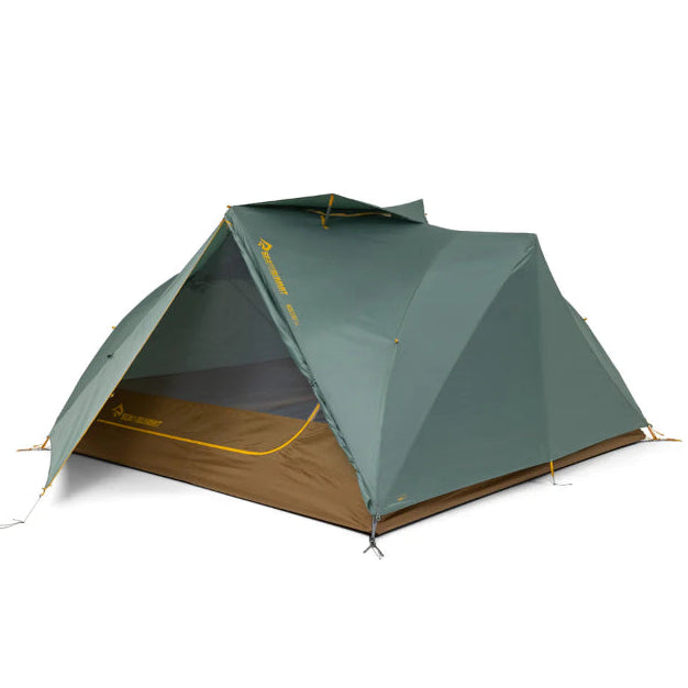 Green camping tent on a white background