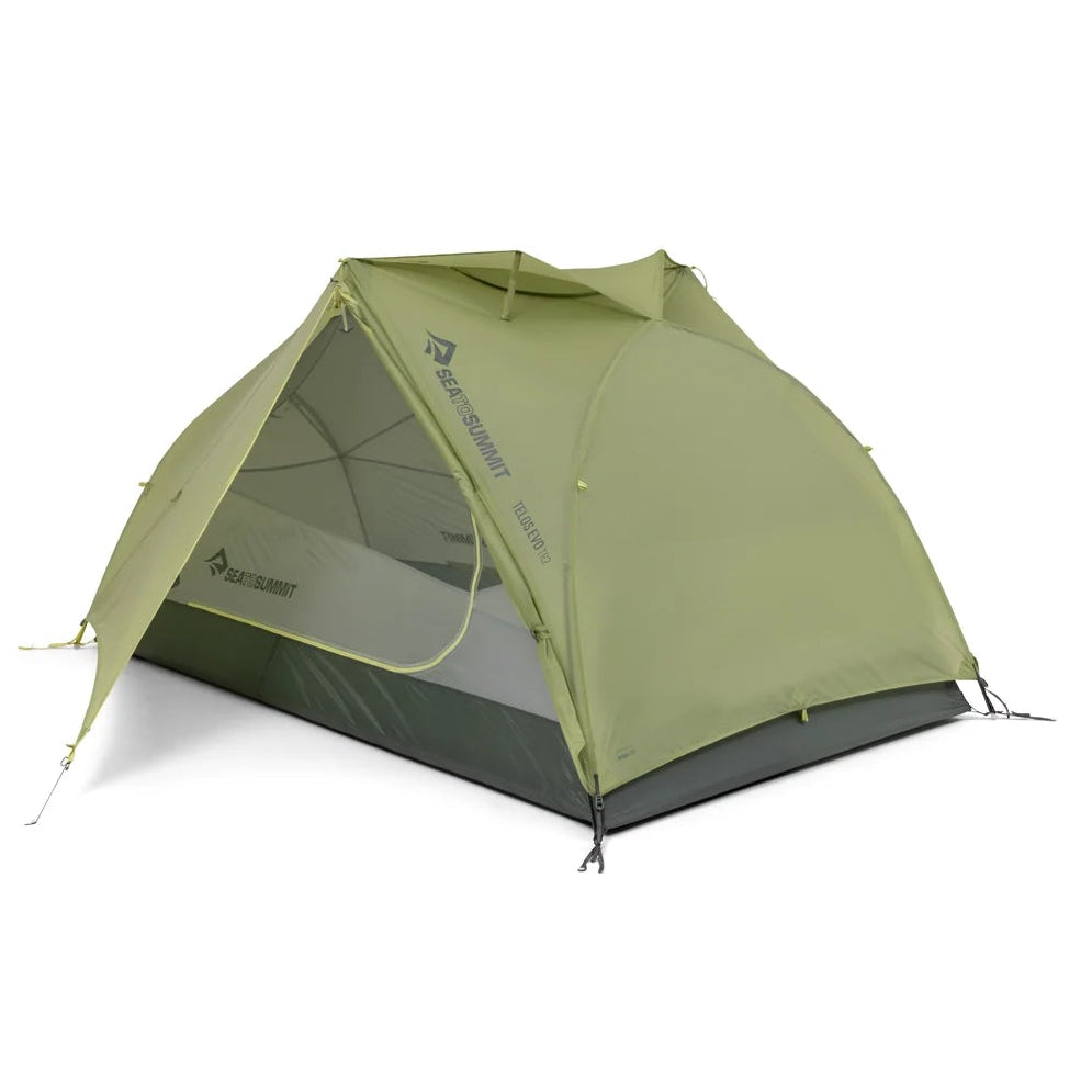Green camping tent on a white background