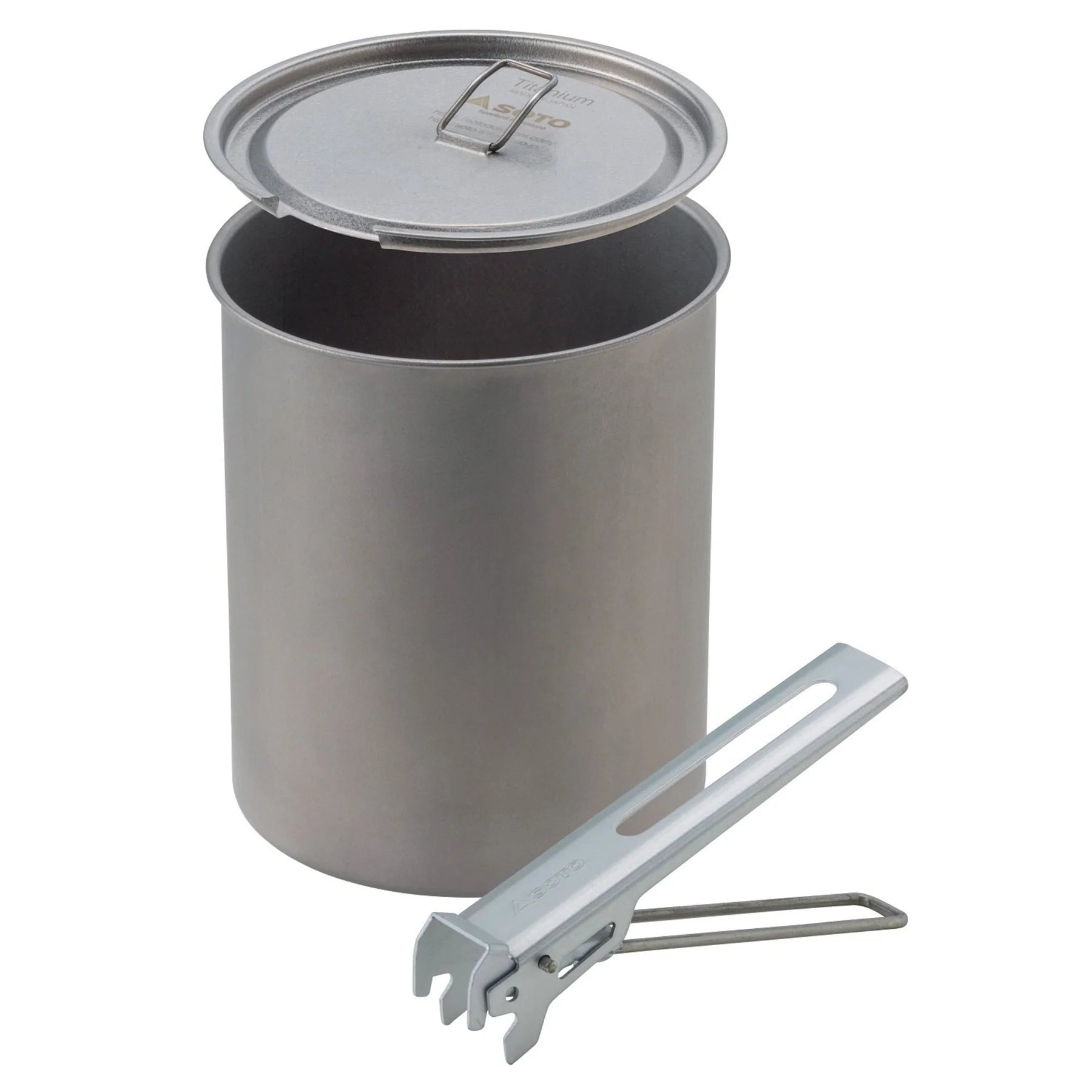 Metal camping pot with lid and utensil on a white background