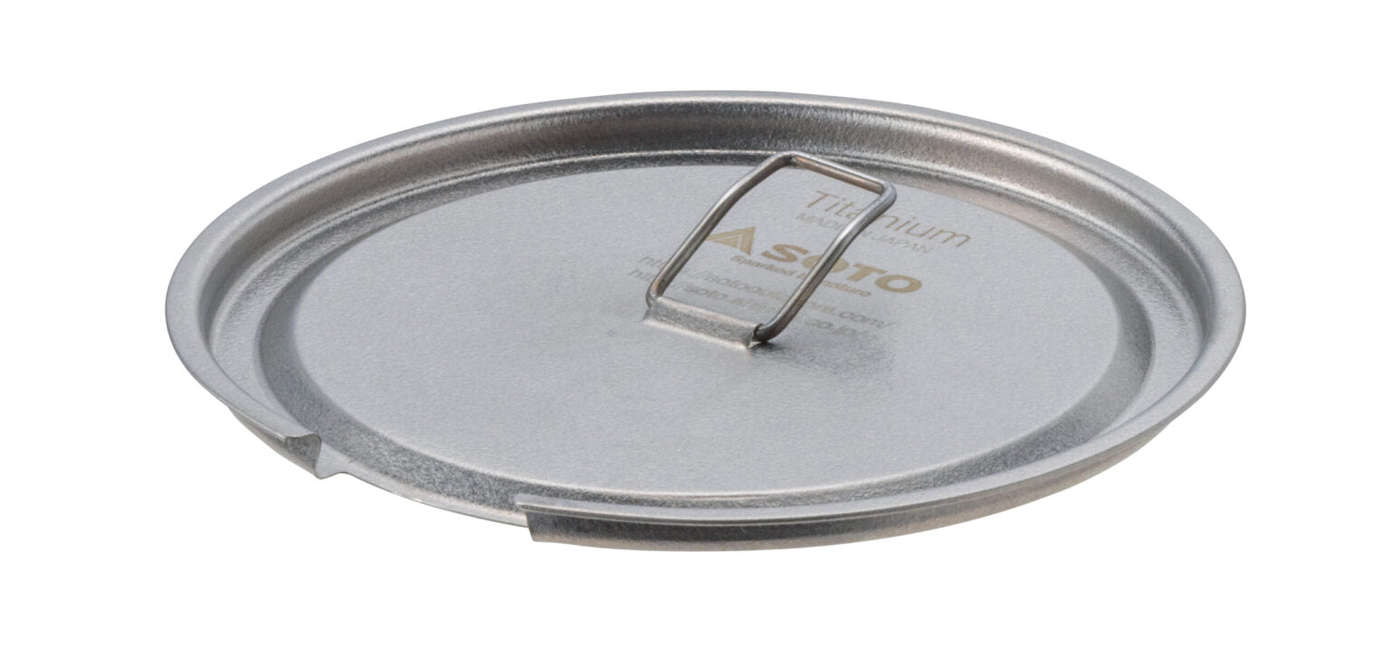 Titanium llid with a brand label on a white background