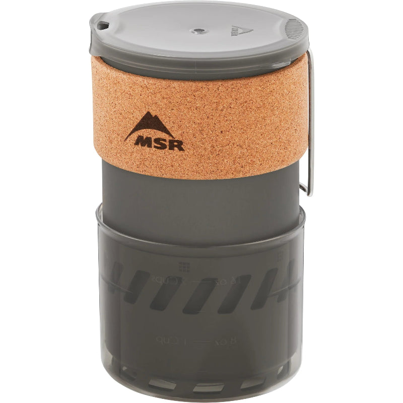 Camping cookware set with cork lid on a white background