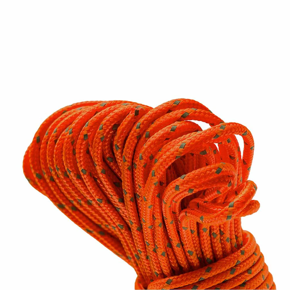 Coiled orange rope with green specks on a white background